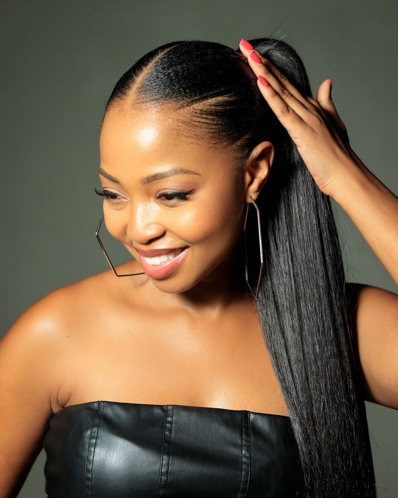 Sleek Ponytail with Reflective Finish