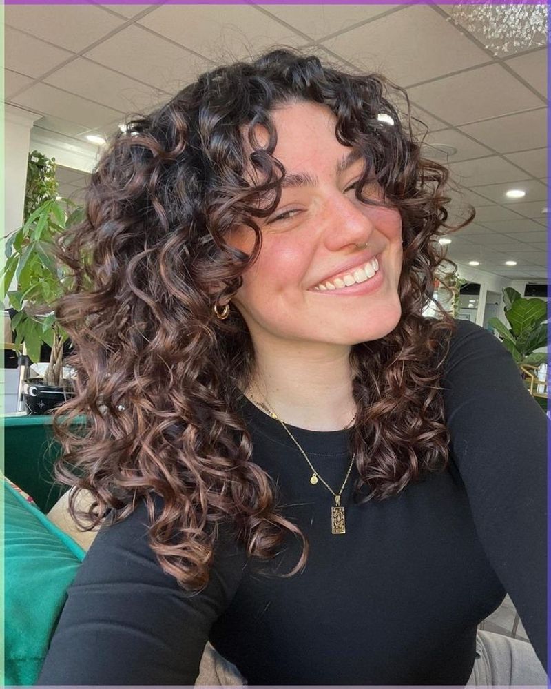 Layered Curls with Side Bangs