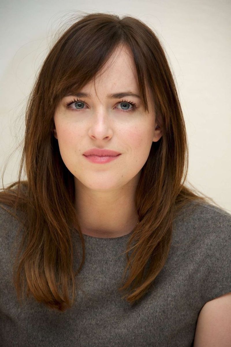 1. Side-Swept Bangs